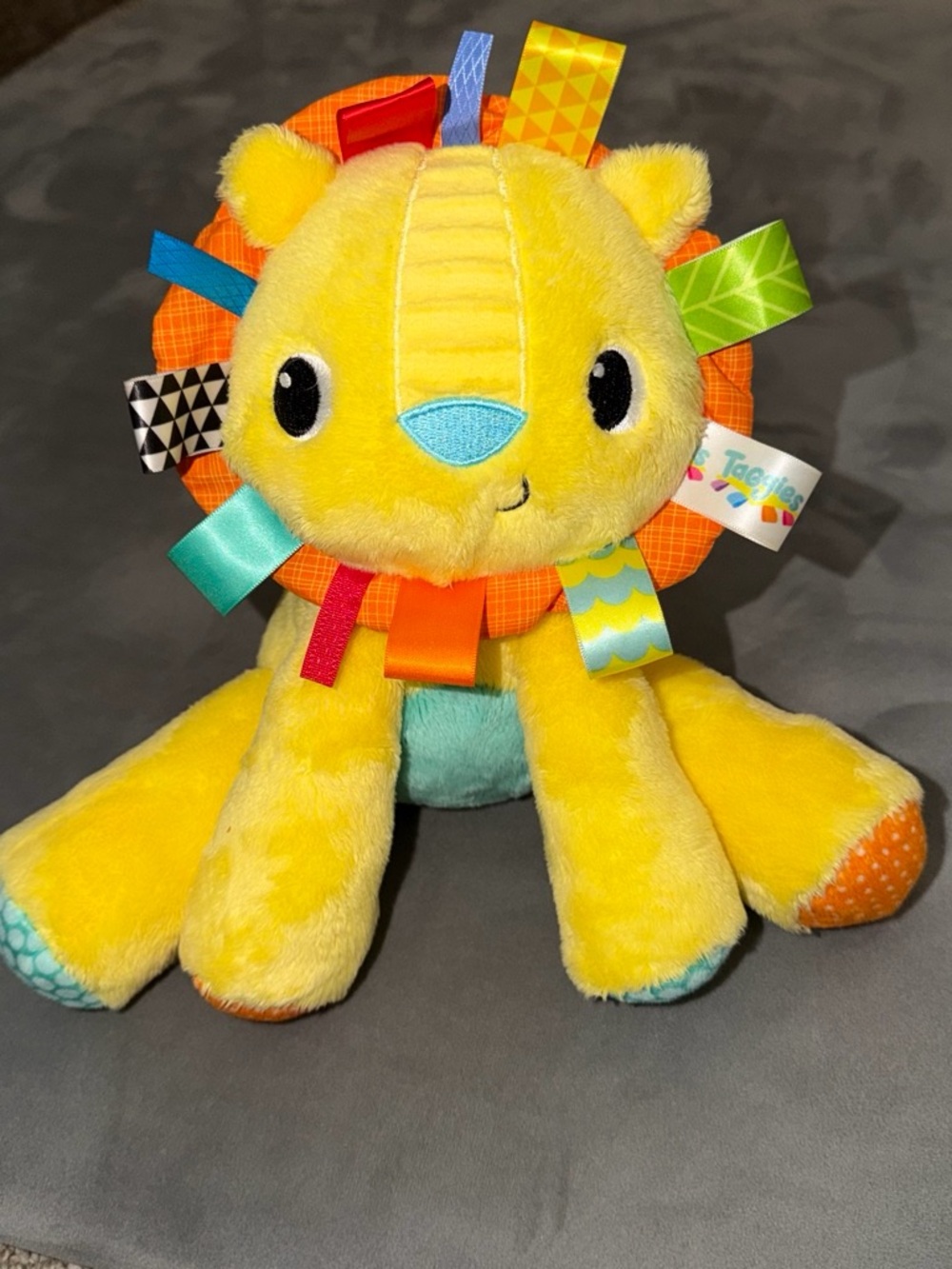 Taggies Yellow Plush Lion with Colorful Sensory Ribbons